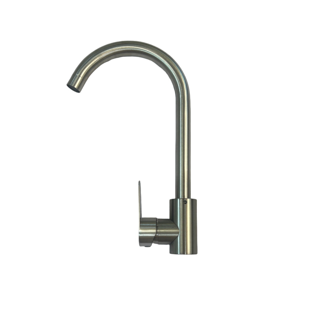 Stainless steel kitchen faucet on a white marble countertop