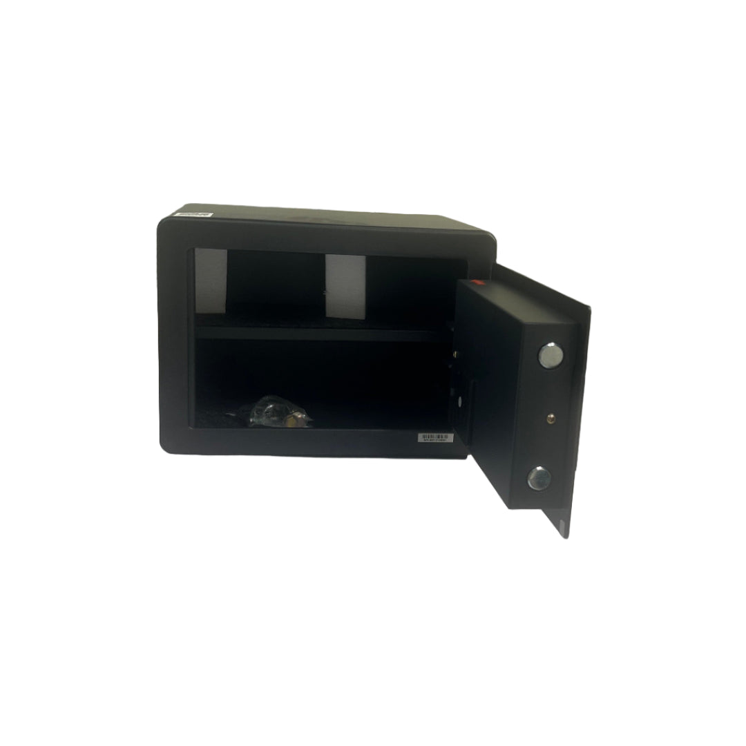 Black metal bracket attached to a white wall with tools and materials on a tiled floor below.