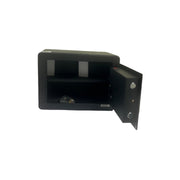 Black metal bracket attached to a white wall with tools and materials on a tiled floor below.