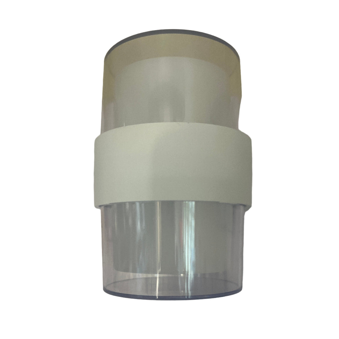 Clear cylindrical object with white base on a plain background