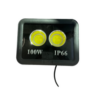 LED flood light with '100W' and 'IP66' rating on a white surface.