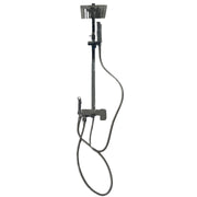 Metal shower head and hose on a tiled floor