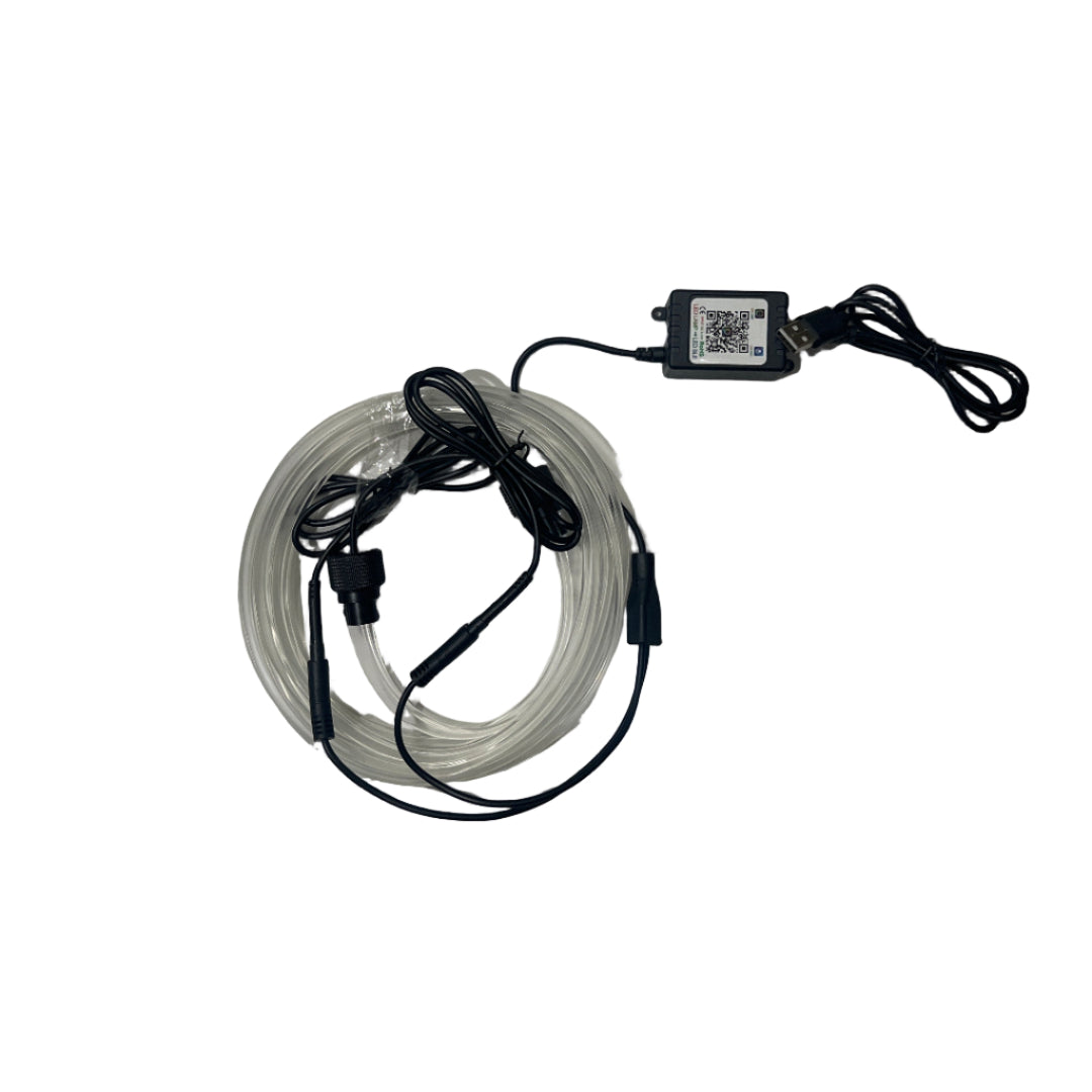 Small electronic device with cables on a white surface