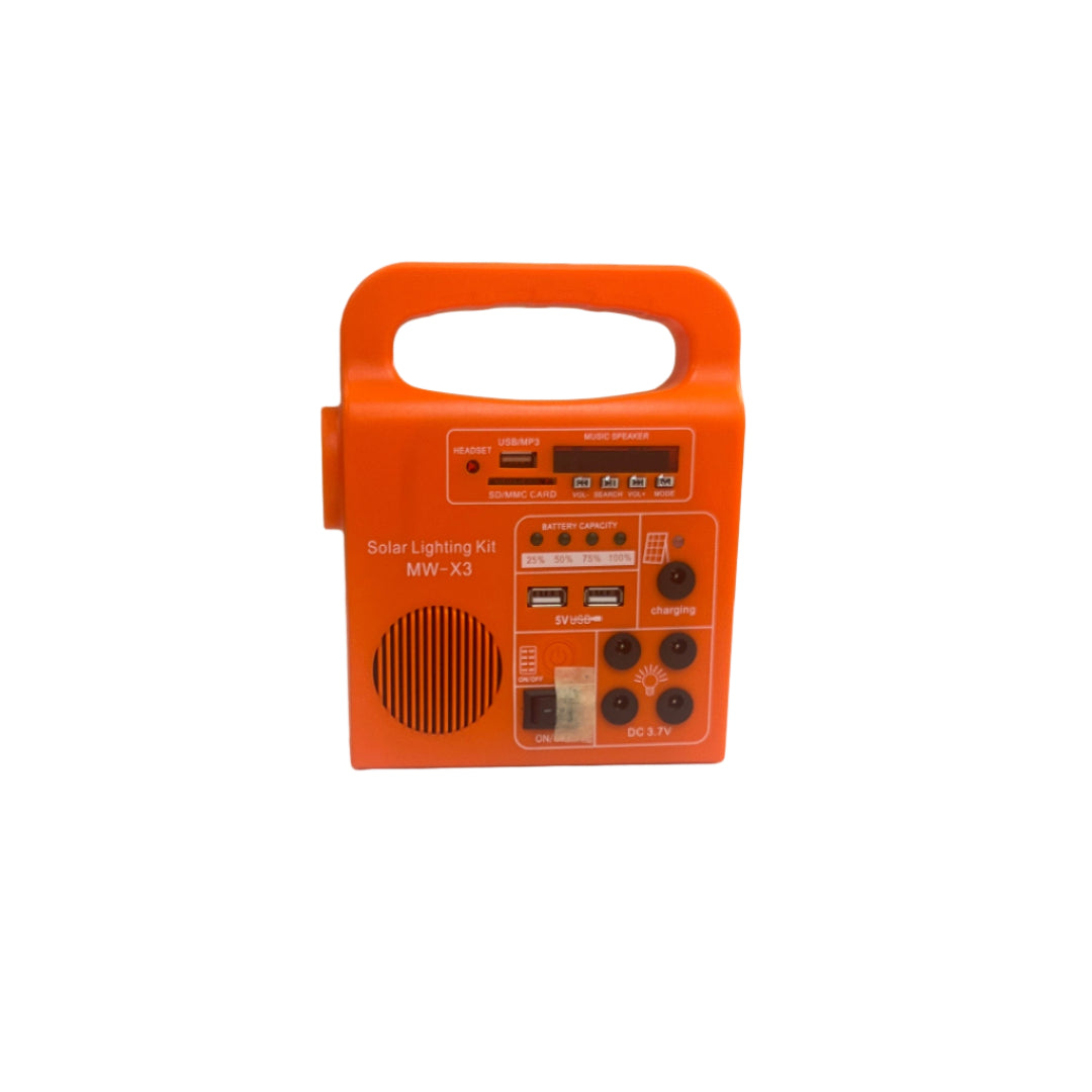 Orange portable radio on a white surface with a blurred background