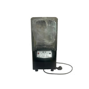 Commercial kitchen equipment on a tiled wall